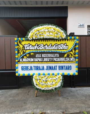 Papan Bunga Duka di Wusama
